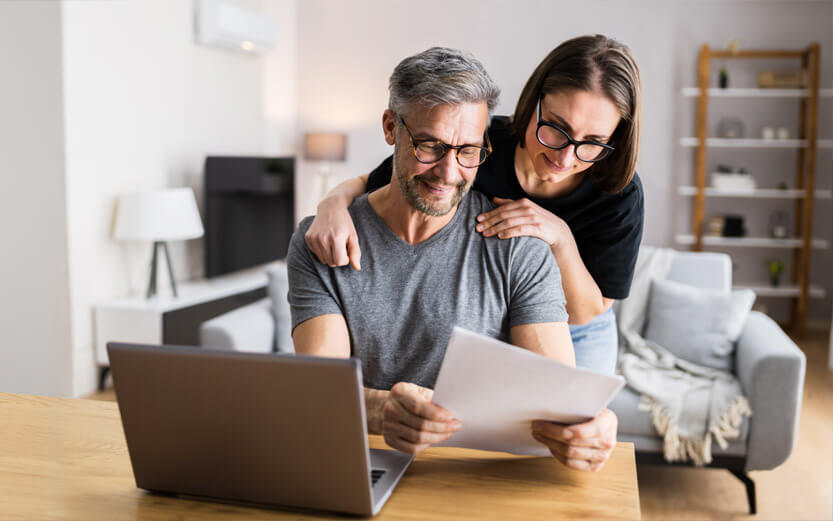 a couple reviewing documents