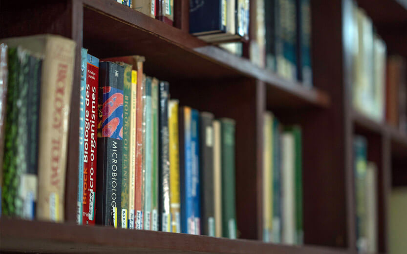 library bookshelves filled with science books