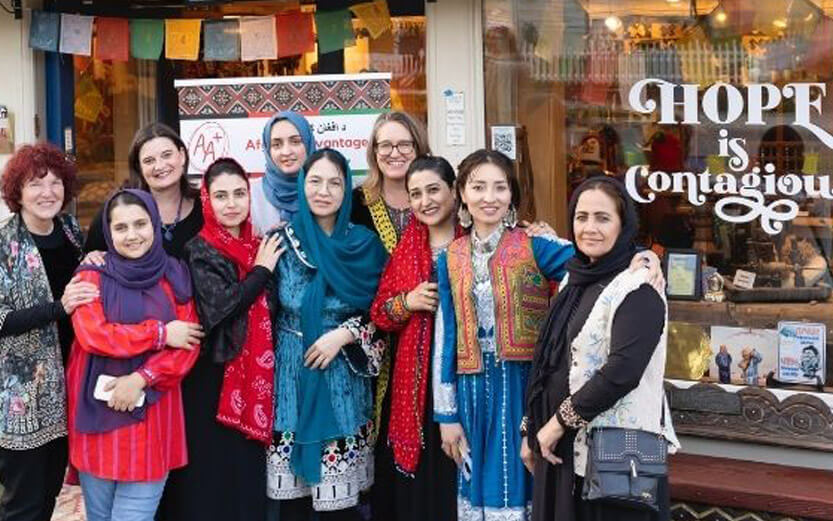 group of women outside a shop