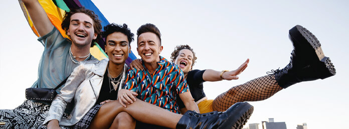 four young LGBTQ+ adults having fun