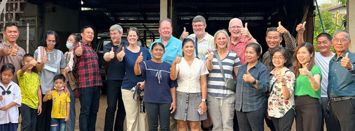 a group of people all giving the thumbs up sign