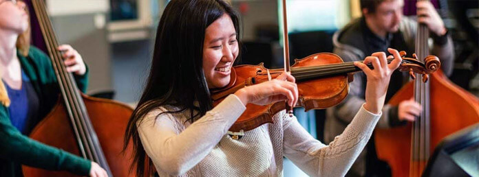 music student playing violin